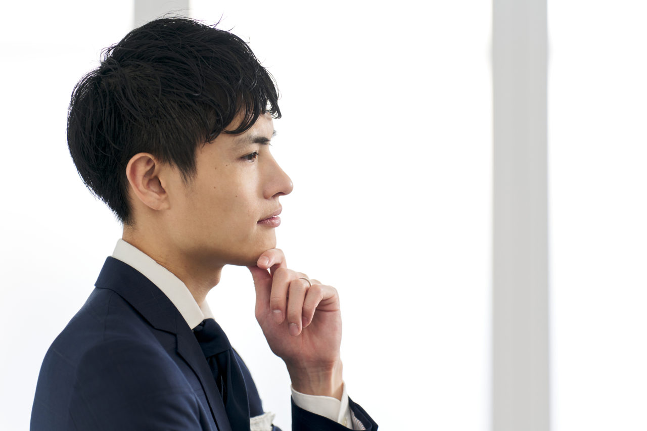 A businessman who is worried about wearing a custom suit